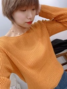 橘色薄款镂空长袖一字，领羊毛衫白色针织衫