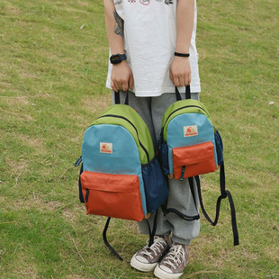 日本糖果色儿童成人书包幼儿园超轻双肩背包竖款方形休闲时尚