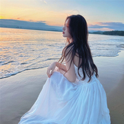 三亚旅游拍照衣服女海边度假沙滩裙超仙白色露背吊带连衣裙仙女裙