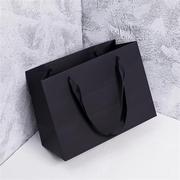 服装店手提袋高档纸袋，定制包装衣服黑色纸盒口袋，简约高端结实