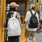 高中轻便书包女大学生，大容量纯色旅行休闲男双肩包电脑包背包