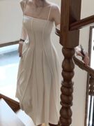 白色吊带连衣裙子女夏季2023茶歇法式气质收腰显瘦小个子长裙