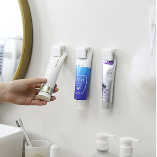 浴室收纳牙膏夹免打孔多用卫生间牙膏洗面奶挂架塑料护肤品收纳夹