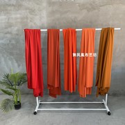 橙色桔红色直贡呢 四面弹力垂顺丝滑布料 轻薄透气裙子背景面料