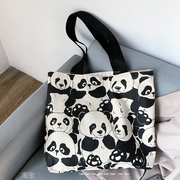 可爱大熊猫双面图案有拉链帆布，包包男女同，款手提书包袋环保布袋潮