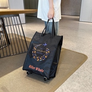 大容量行李包带滑轮手提袋外出装衣物收纳袋购物可折叠拖拉旅游包