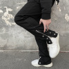 spnnx高街黑色排扣牛仔裤，潮工装机能设计感hiphop显瘦复古长裤男