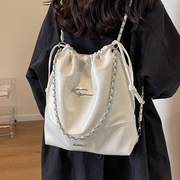 韩国小众夏季包包女2023链条抽绳小书包质感腊皮双肩包旅行包
