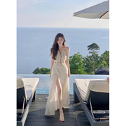 泰国三亚旅游拍照沙滩，裙海边度假连衣裙，纯欲性感镂空白色吊带长裙