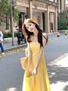 黄色吊带连衣裙女夏2024海边度假温柔风甜美修身气质法式长裙