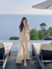 泰国三亚旅游拍照沙滩裙，海边度假连衣裙，纯欲性感镂空白色吊带长裙