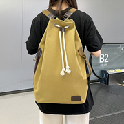 帆布多功能双肩包男大学生书包女设计感束口手提背包大容量电脑包