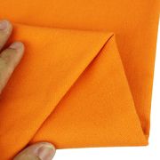 半米价橙色纯棉帆布布料做包diy桌布窗帘布，沙发布靠垫加厚耐磨
