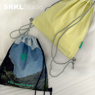 SRKLstudio 出游系列｜印花收纳袋帆布尼龙拼接 户外抽绳束口背包