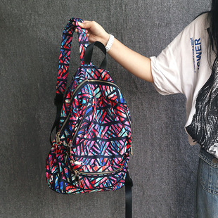 时尚个性彩色布包双肩包大学生书包女轻便大容量旅行背包旅游包