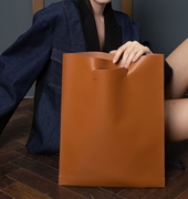 欧美时尚简约手提手拿包个性，皮革女手包小众设计女包信封包文件包