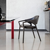 北欧设计师椅子侘寂极简意式靠背餐椅家用实木高级真皮洽谈扶手椅
