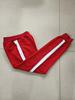 订做四季纯棉中小学生校裤大红色，拼白宽杠反光细条休闲运动校裤子