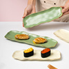 北欧轻奢金边甜品盘长方异形点心盘家用创意陶瓷曲巢寿司水果盘子
