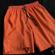 橙色运动短裤男夏季冰丝，薄款橘色休闲五分裤，潮牌橘红色纯色裤子夏