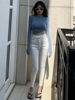 乳白色牛仔裤女春季设计感韩版弹力紧身显瘦九分高腰小脚裤子