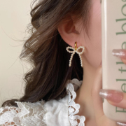 韩国蝴蝶结珍珠耳钉女纯银，小众设计感耳环，2024年高级耳饰