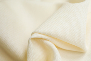 意大利进口薄款温润象牙白色细腻提花编织纯羊毛面料设计师布料