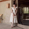 仙女风重工白色连衣裙设计师春夏气质小众蕾丝镂空花朵长裙子