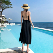海边度假风女装性感露背吊带长裙，交叉细肩带沙滩裙夏季高腰小黑裙