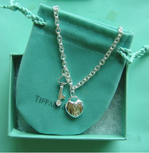 Tiffany collar de plata al por mayor de moda pequeño collar vintage mujer amor suéter joyas collar de cadena de pequeños islotes
