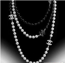 Calidad clásico y elegante en blanco y negro a doble cara SA chanel collar de perlas largo collar