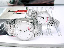La nueva pareja de reloj de acero [55932] artículos de moda caliente tomado en especie